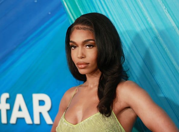 Lori Harvey Shows Off Oiled Up Legs & Curves In Sexy New Photo